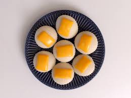 a plate of food on a white surface